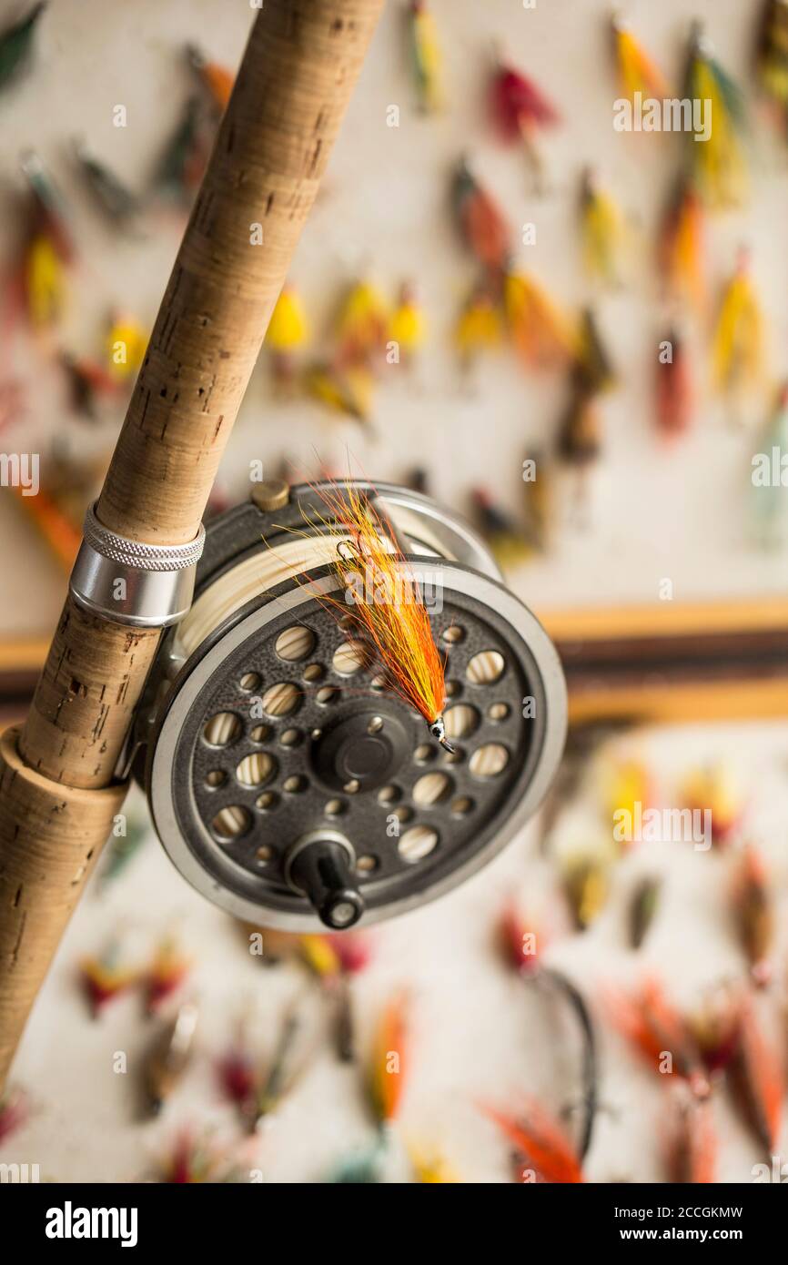 A collection of salmon flies in a fly box or reservoir, with a J.W. Young & Sons 1540 salmon reel and a Bruce & Walker Norway salmon fly rod. Some of Stock Photo