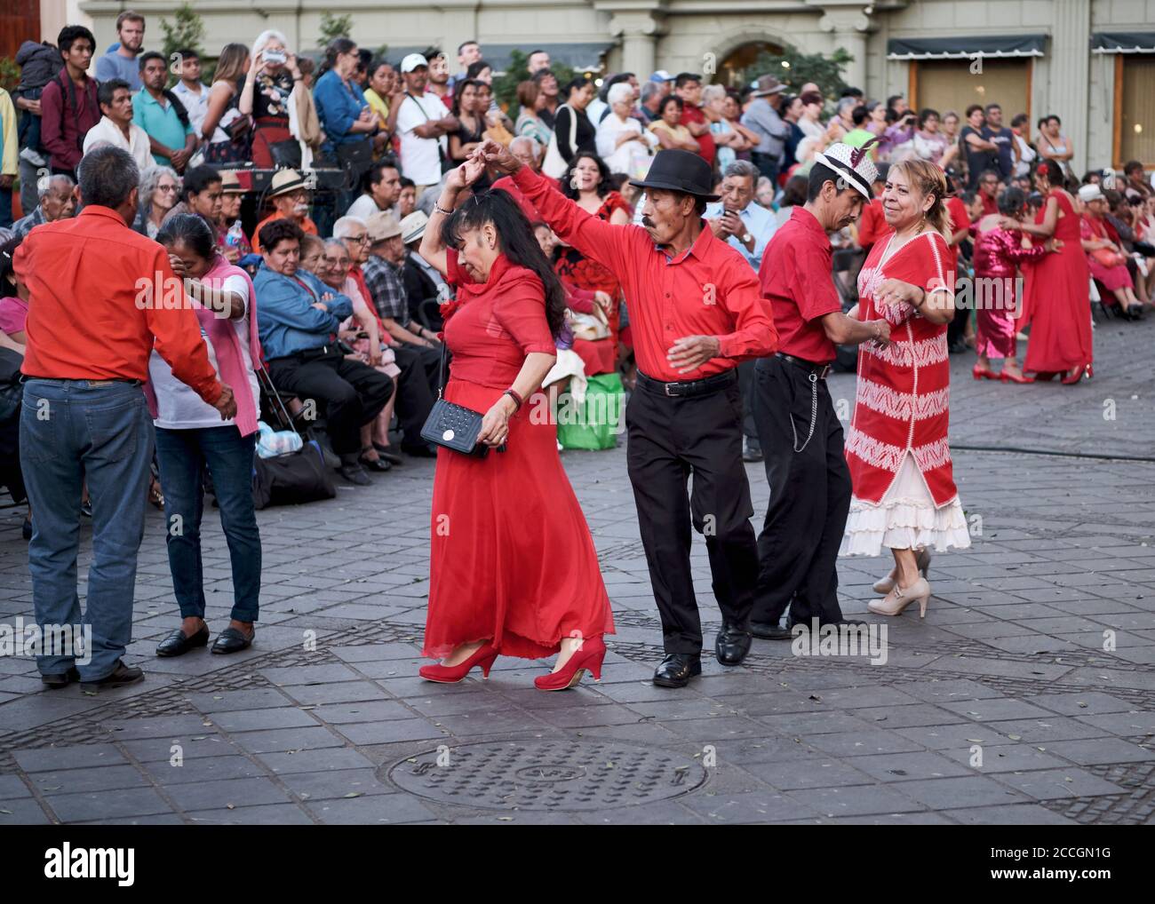 Couples dressed in red dancing part of weekly "Wednesday Dancing" at Zocalo in Oaxaca city. The red outfits mark the festival of Valentine's day Stock Photo - Alamy Couples dressed in red dancing part of weekly "Wednesday Dancing" at Zocalo in Oaxaca city. The red outfits mark the festival of Valentine's day Stock Photo - Alamy