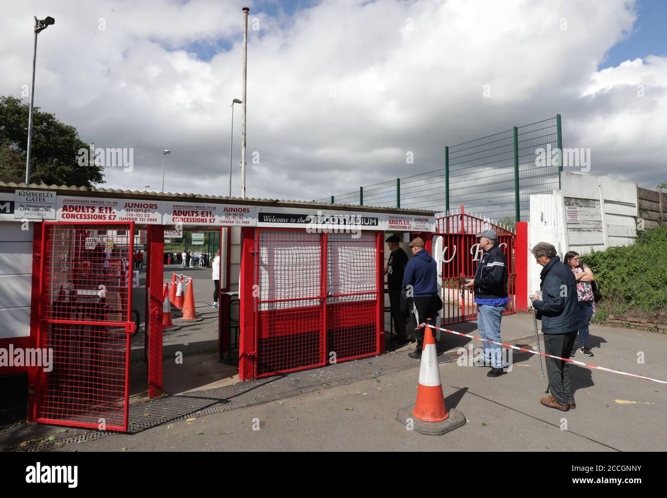Fans queue for the pre-season friendly match at the Trico Stadium, Redditch. Stock Photo