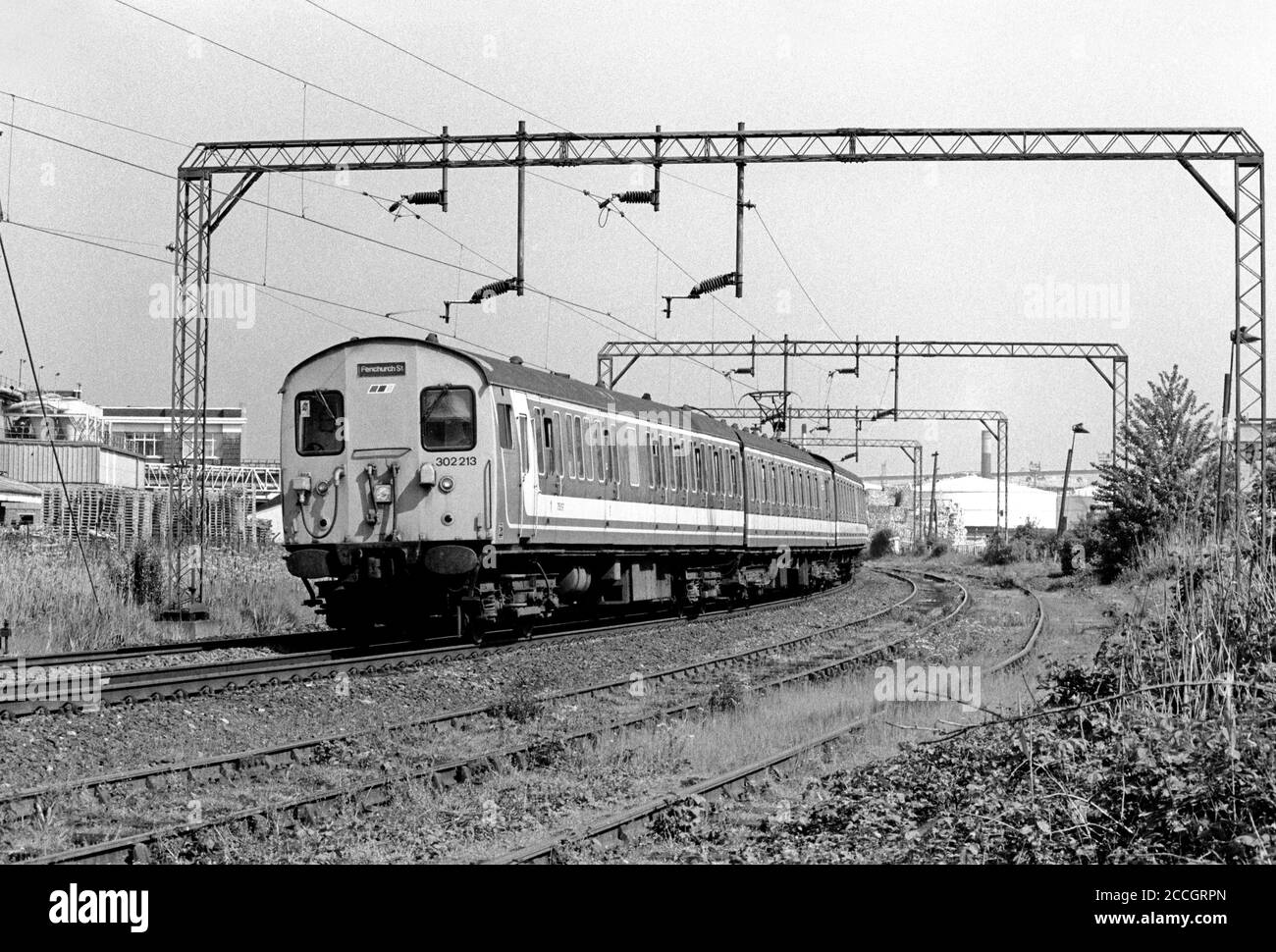 A Class 302 electric multiple unit number 302213 working Network SouthEast service at Purfleet on the 20th May 1991. Stock Photo