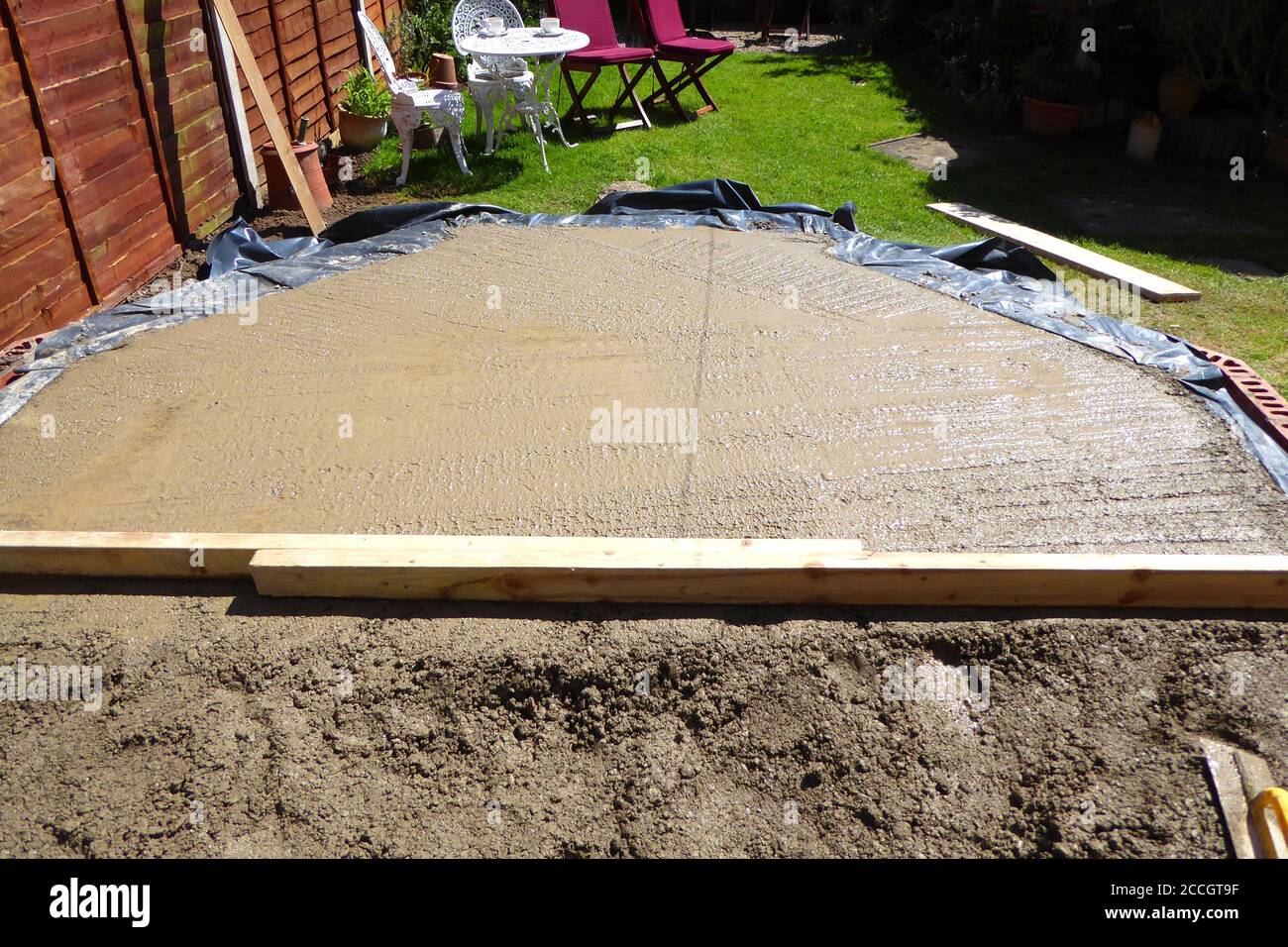 Close Up Of Concrete Foundation For Conservatory Base Concrete Leveling For House Extension In Garden With Grass In Summer Sun Stock Photo Alamy