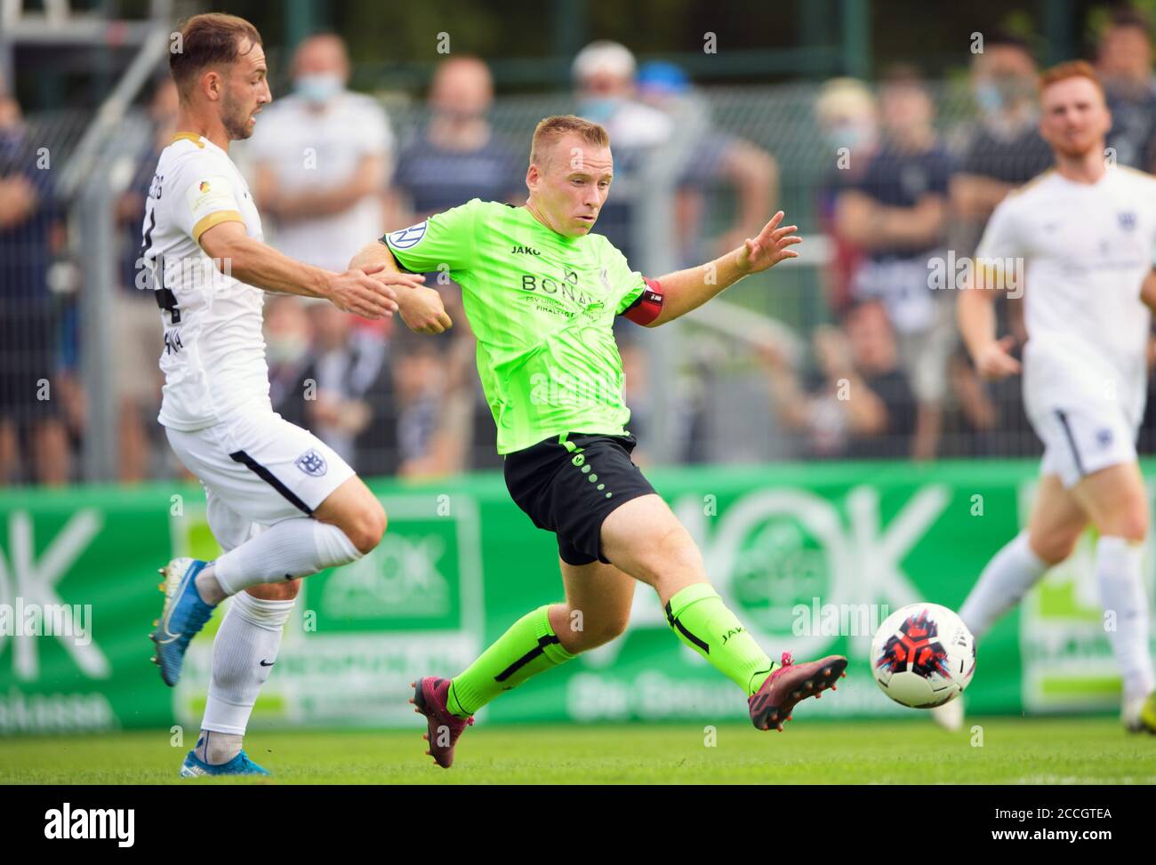 22 August 2020, Brandenburg, Luckenwalde: Football: Brandenburg Cup, SV Babelsberg 03 - Union Fürstenwalde, final, at the Werner-Seelenbinder Stadium. Ingo Wunderlich (M) from Fürstenwalde in a duel with Tobias Dombrowa (l) from Babelsberg. Photo: Soeren Stache/dpa-Zentralbild/dpa Stock Photo