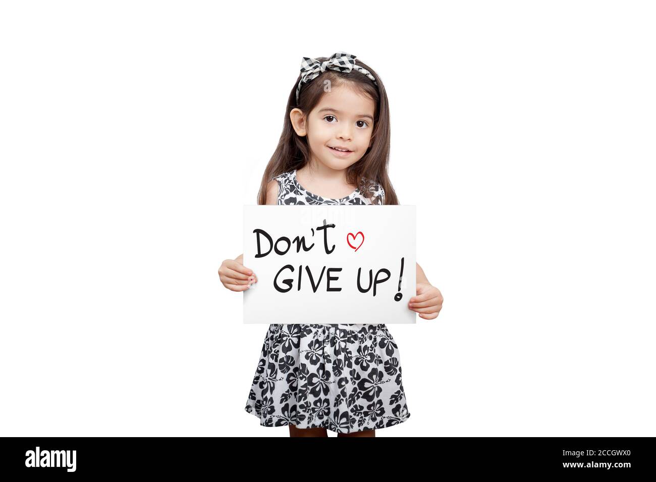 Giving encouragement concept, Cute girl holding a dont give up sign standing on white background. Cute mixed race girl half Thai, half English model Stock Photo