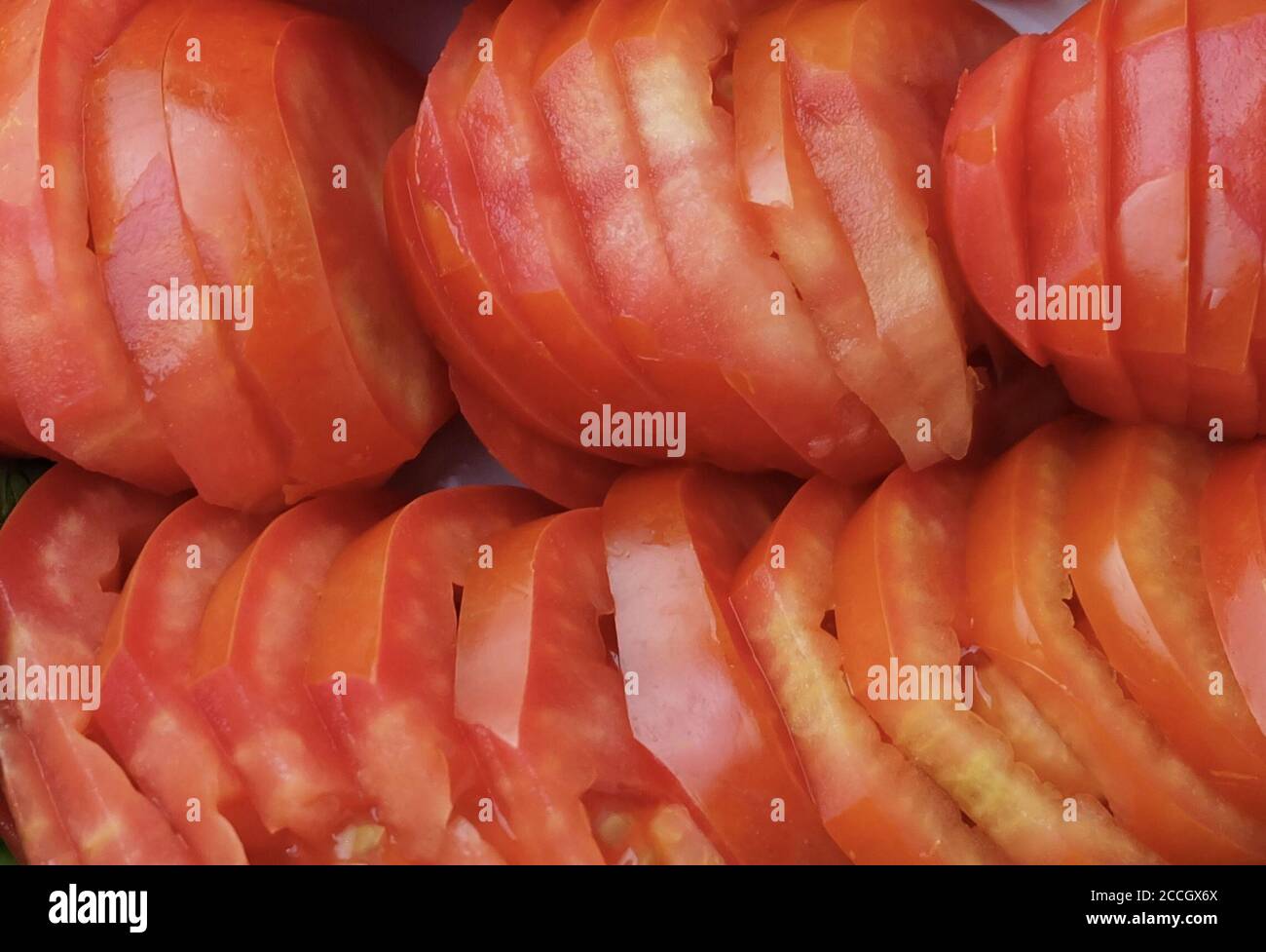 Vegetable, Close Up of Fresh Ripe Sliced Red Tomatoes. High in Vitamin C and A. Stock Photo