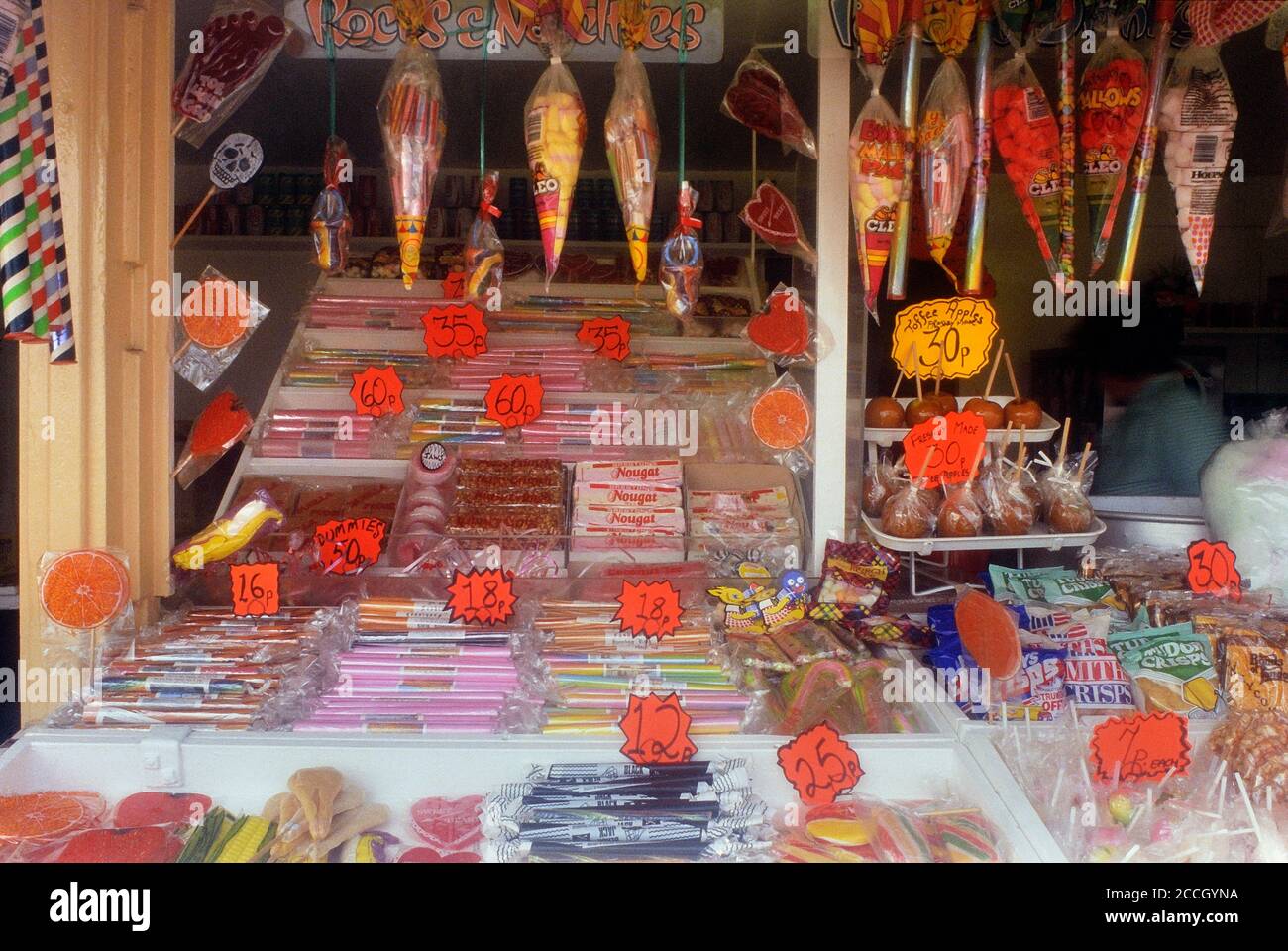 Brighton candy, sweets & rock stall, East Sussex. England. UK. Circa 1980's Stock Photo