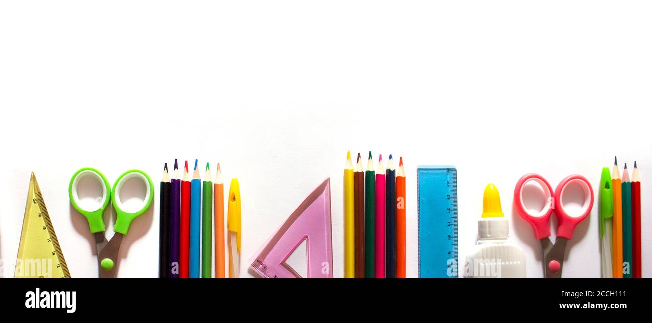 Back to school background concept. School supplies on a white ...