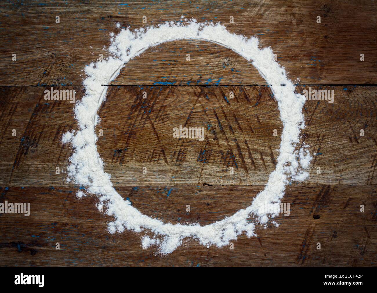 Frame Flour round flour frame on old brown wooden retro background with copy space ...