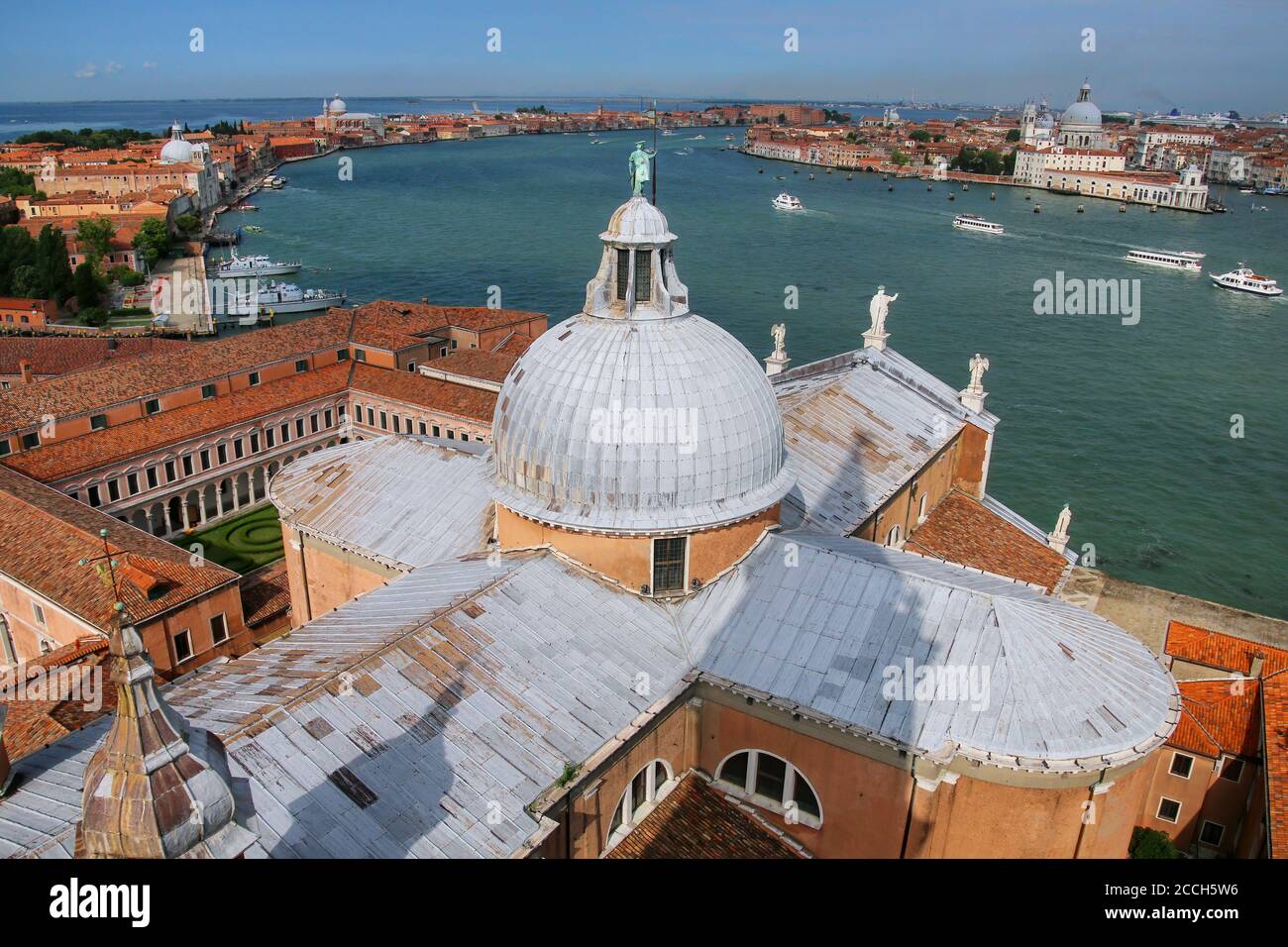 View of the dome of San Giorgio Maggiore church and Giudecca Canal in Venice, Italy. Venice is situated across a group of 117 small islands that are s Stock Photo