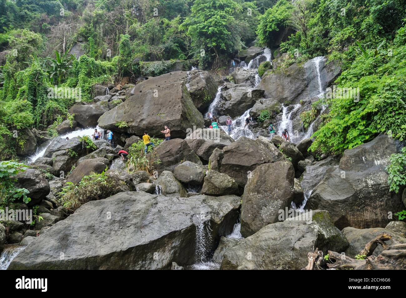 Tourists enjoying the hilly 'Mayabi Jhorna' waterfalls located at the Jaflong in Sylhet during the coronavirus pandemic. Sylhet, Bangladesh. Stock Photo
