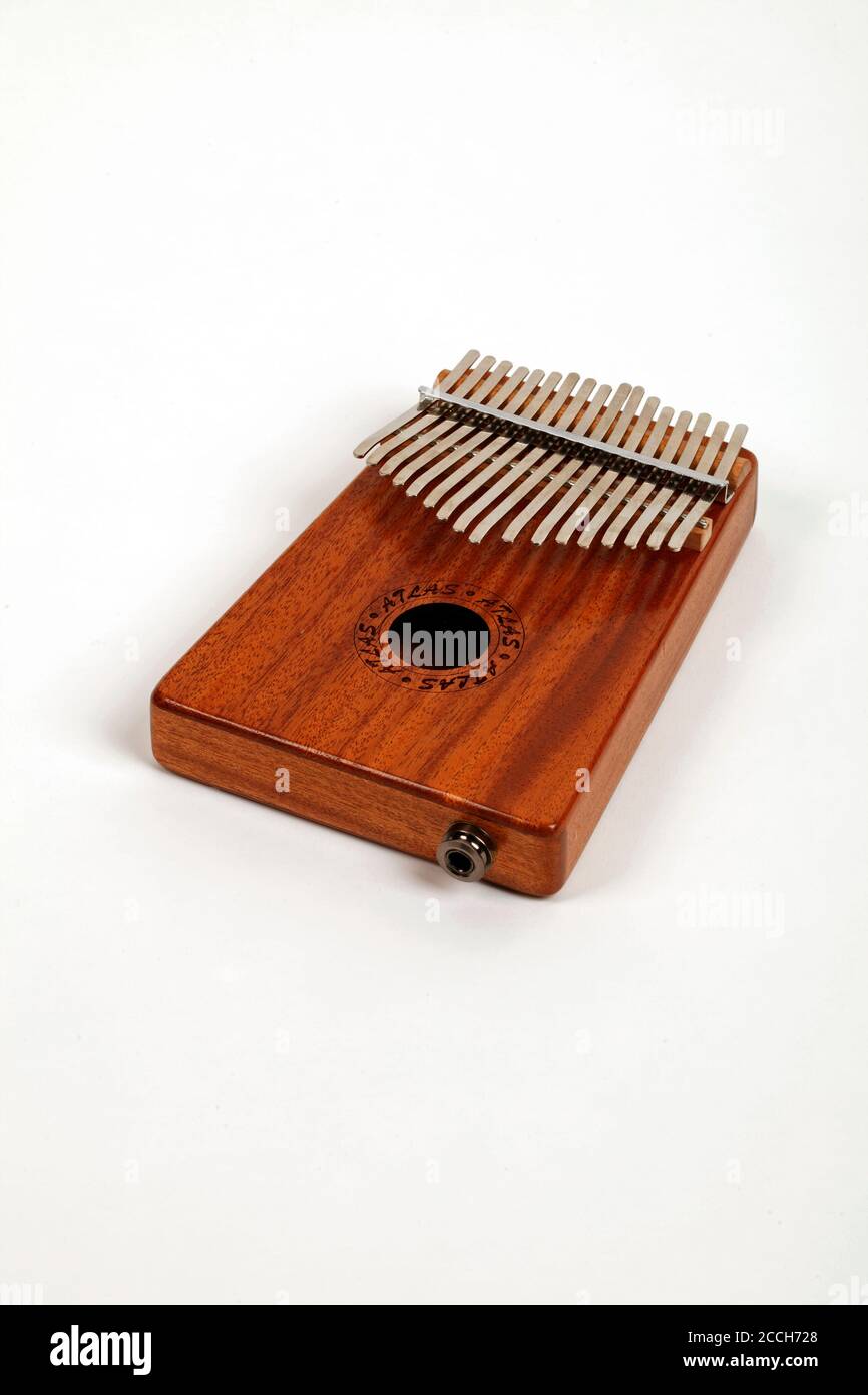 17 note Kalimba in the key of C. Thumb piano, sound box, resonator. Made by  Atlas. complete with an electronic jack socket and pick up Stock Photo -  Alamy