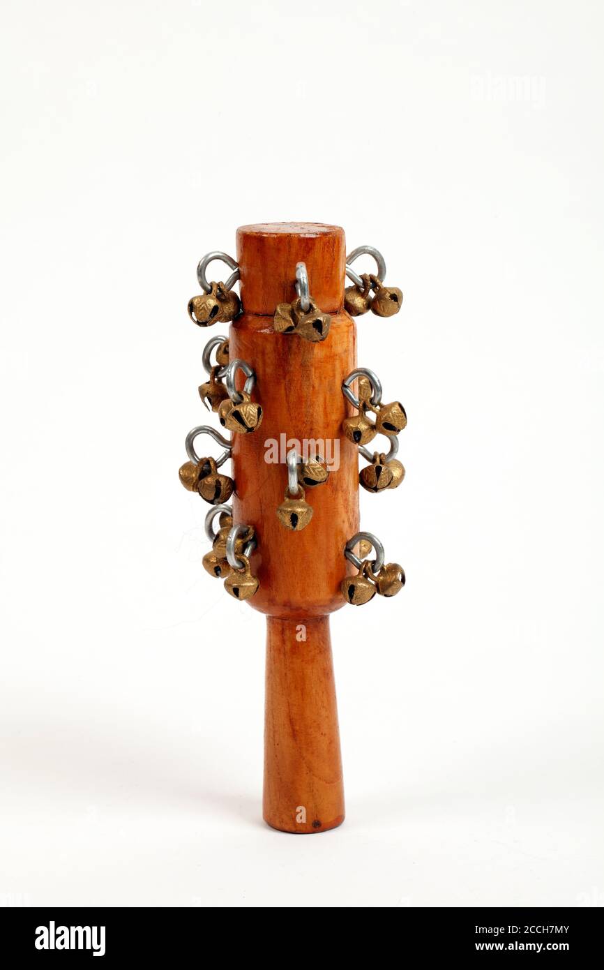 Gunghroo shaker made up of ankle bells on a wooden stick Stock Photo Alamy