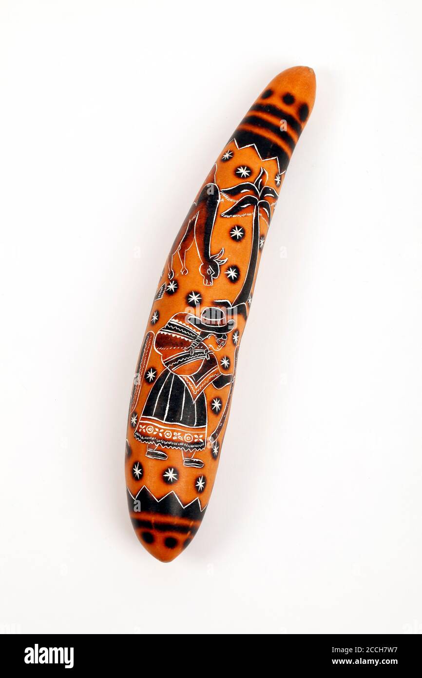 Highly decorated Gourd Guiro. From Peru. Also a shaker Stock Photo Alamy