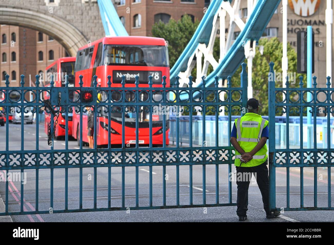 Traffic waiting behind the locked gates of Tower Bridge in London, after the bridge became stuck open, causing traffic chaos. Stock Photo