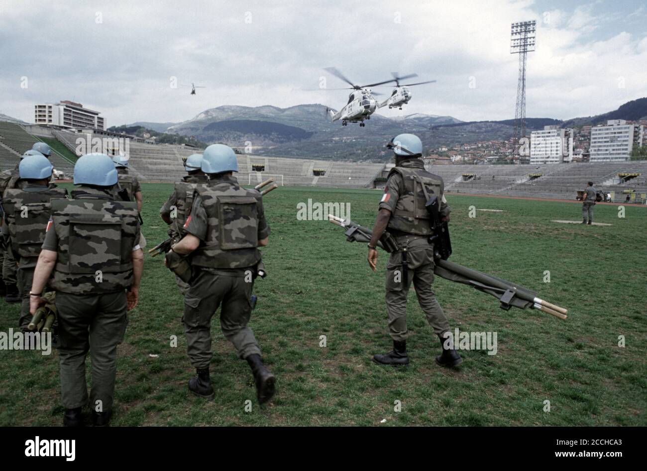 25th April 1994 During the Siege of Sarajevo: inside Koševo Stadium, a  stretcher party of French soldiers are ready as Puma helicopters ferry the  injured from Goražde Stock Photo - Alamy