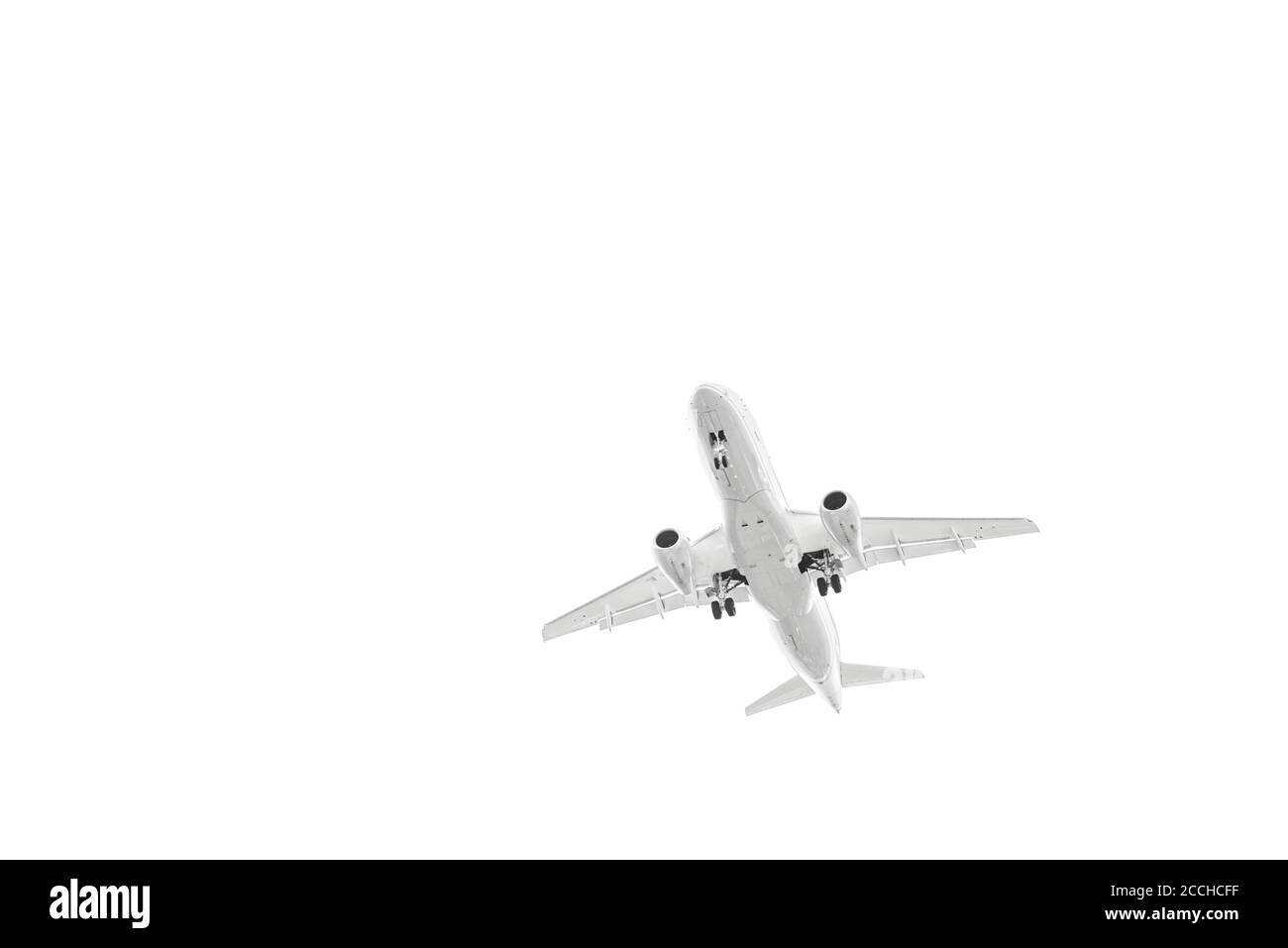 The airplane flying in the sky a close up the bottom view? isolated on the white Stock Photo