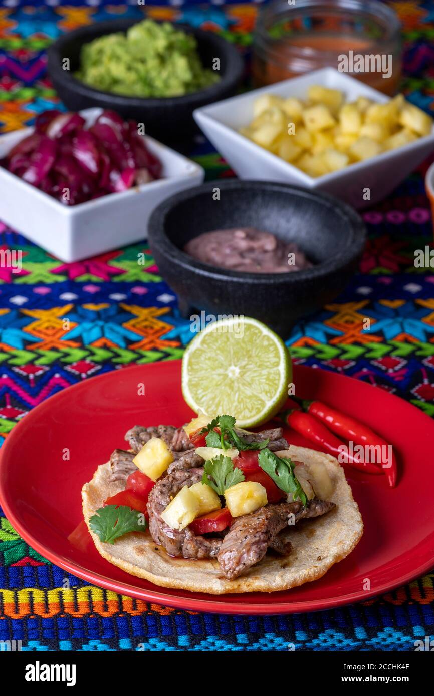 mexican tortilla with salsas and ingredients Stock Photo