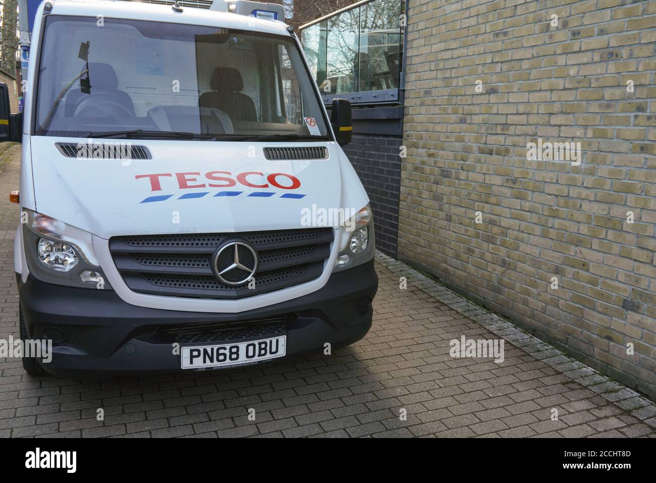 London, United Kingdom - February 03, 2019: White Tesco delivery van parked in small street, British supermarket offers food and groceries deliveries Stock Photo