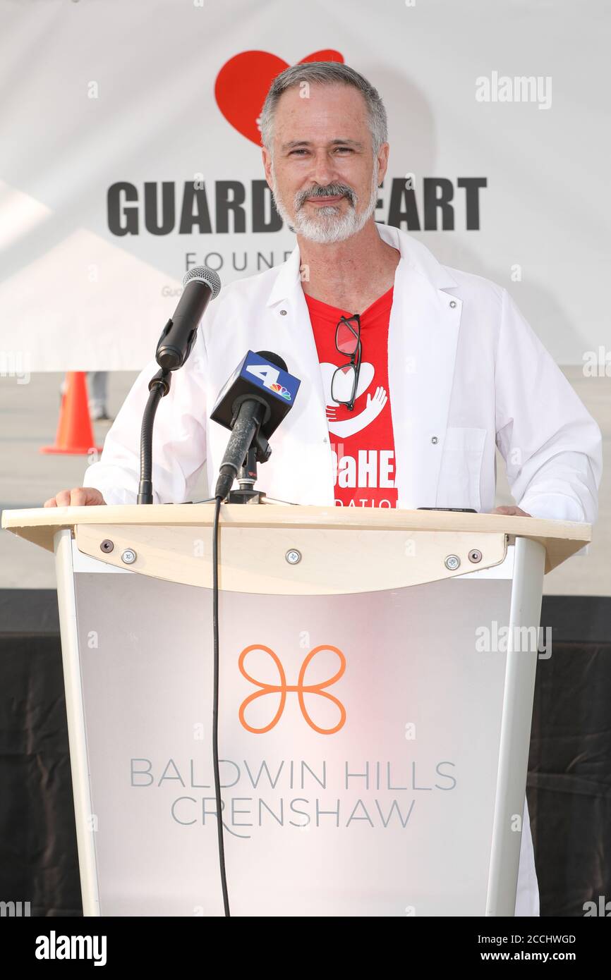 Los Angeles, California, USA. 20th August, 2020. Dr. Douglas S. Harrington, Chairman of GUARDaHEART Foundation, shares the results of 2,000 patients and six days of testing at the GUARDaHEART COVID-19 Antibody Testing at the Baldwin Hills Crenshaw Plaza in Los Angeles, California where SARS-CoV-2 serology antibody tests were provided at no cost to the community. Credit: Sheri Determan Stock Photo
