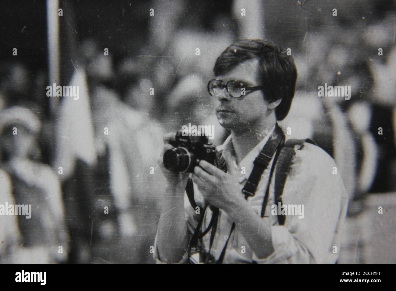 fine-1970s-vintage-black-and-white-photography-of-a-photographer-taking