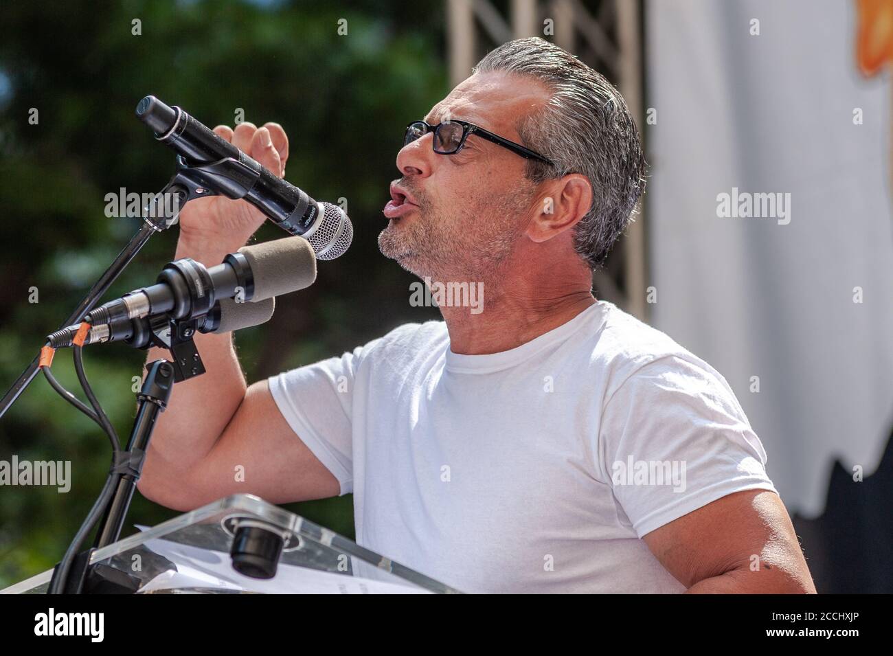 Artist Scott LoBaido speaks at the "Take Back Our Cities" rally in New