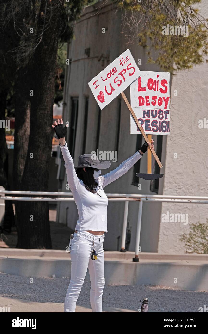 Tucson, Arizona, USA. 22nd Aug, 2020. Demonstrators outside of a Tucson  Post Office protesting the Trump administrations attack on the postal  service. They came to show support for the institution of the