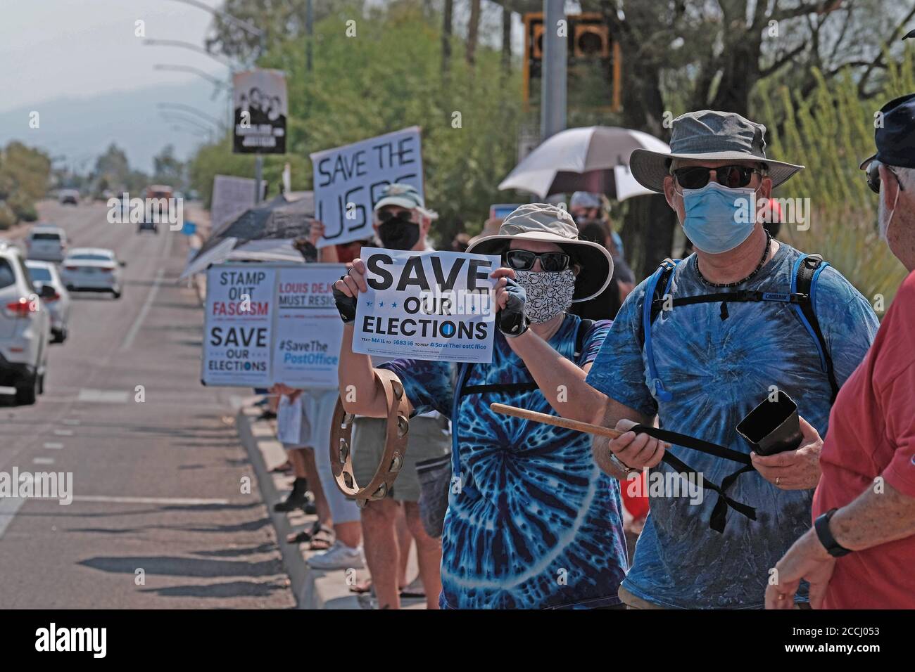 Tucson, Arizona, USA. 22nd Aug, 2020. Demonstrators outside of a Tucson  Post Office protesting the Trump administrations attack on the postal  service. They came to show support for the institution of the