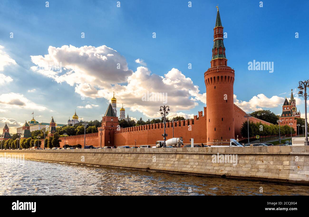 Moscow Kremlin in summer, Russia. It is top tourist attraction of Moscow. View of old famous Moscow Kremlin and embankment at Moskva River. Urban land Stock Photo