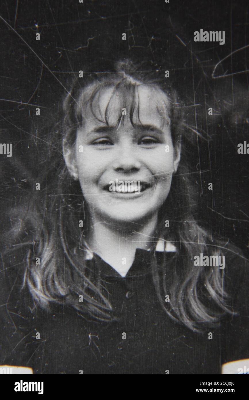 Fine 1970s vintage black and white photography of a portrait of a happy ...