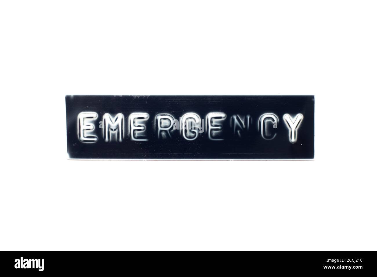 Embossed letter in word emergency on black banner with white background Stock Photo