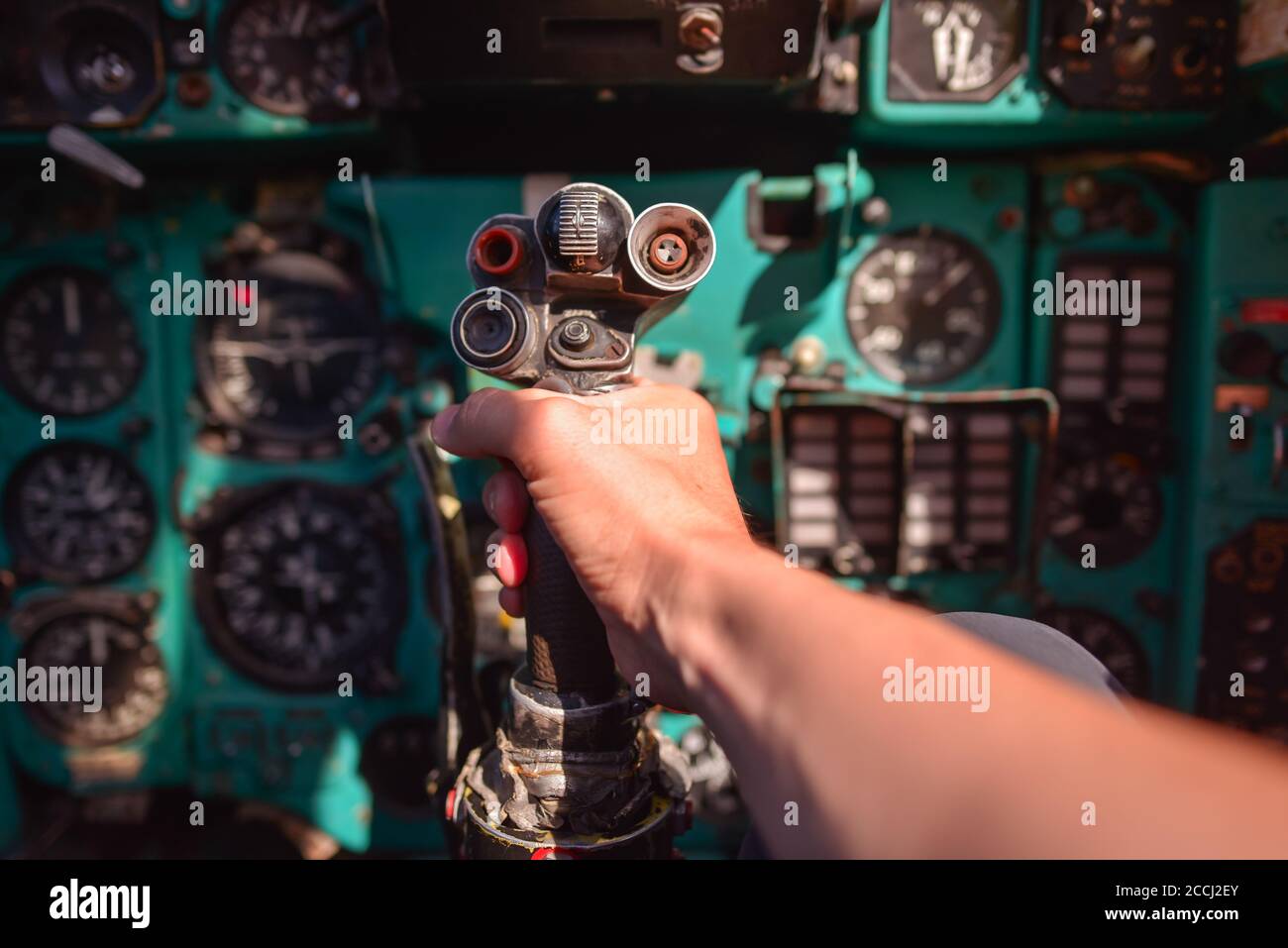 unrecognizable person hand holding joystick of old Soviet military Mig-21  jet airplane parking in park next to military museum, Kiev, Ukraine Stock  Photo - Alamy
