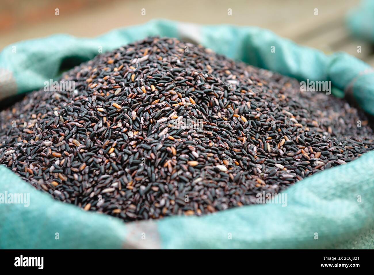 Sack rice in market hi-res stock photography and images - Alamy