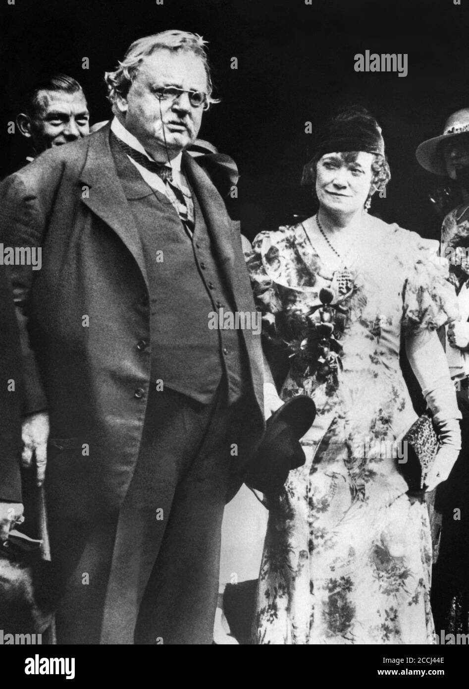 G.K. Chesterton and his brother Cecil's wife, Ada, after the wedding ceremony of Ada's secretary, Miss Dunham, to G.H.N. Phillipps in London, England, September 4, 1933. Stock Photo