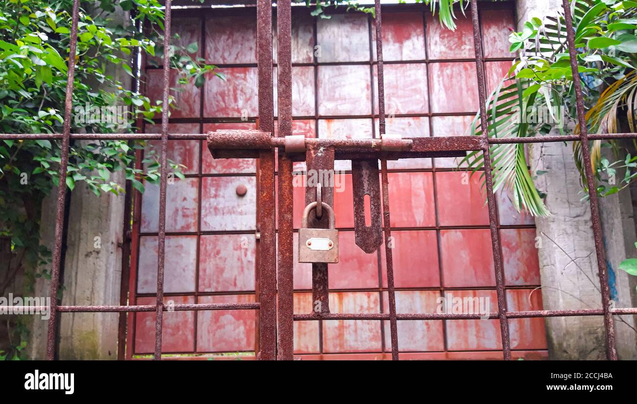Closed Iron Gate with lock. Padlock on Iron Gate Stock Photo Alamy