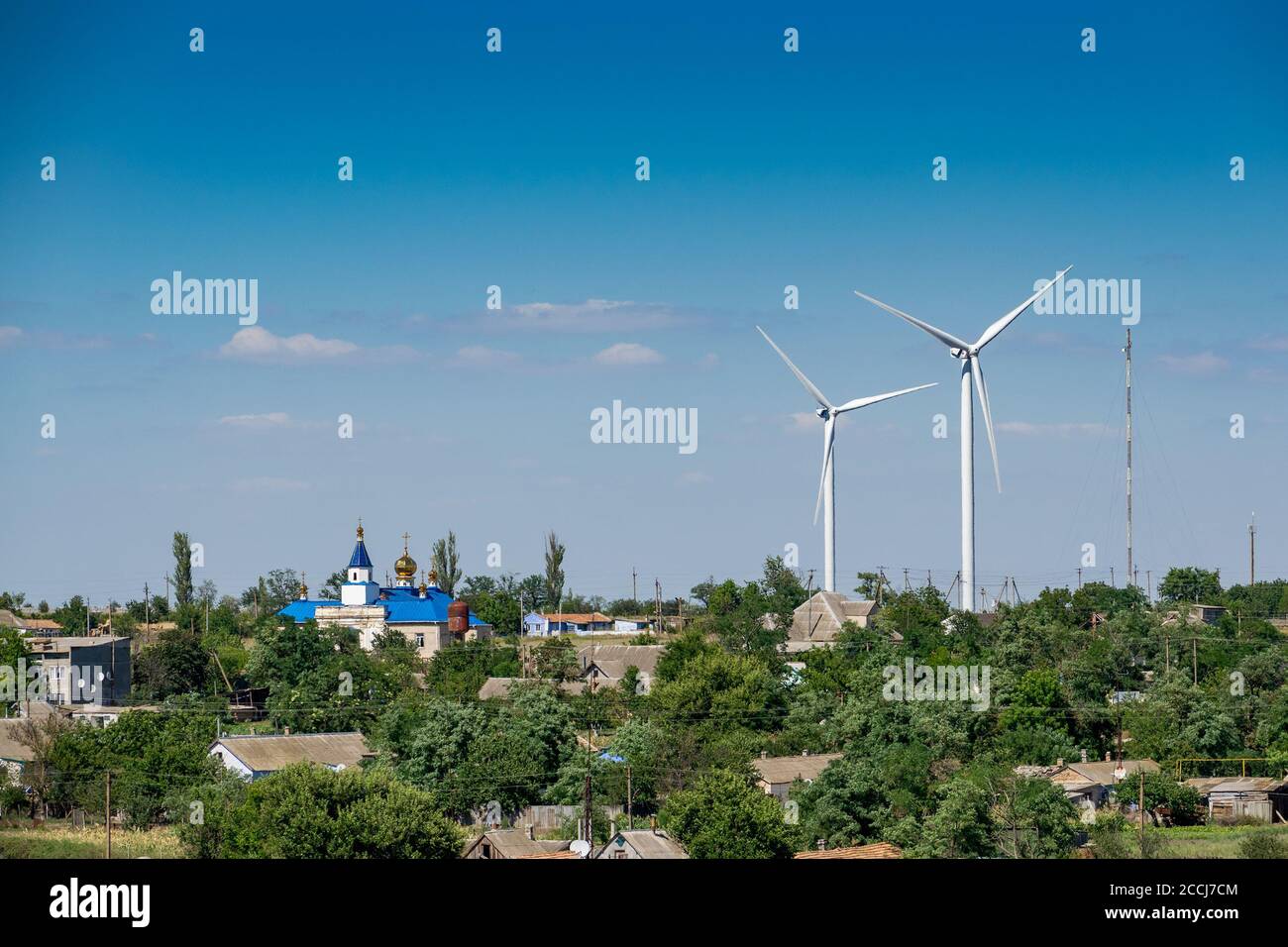 Wind turbines on the hill in the rural area landscape Stock Photo - Alamy