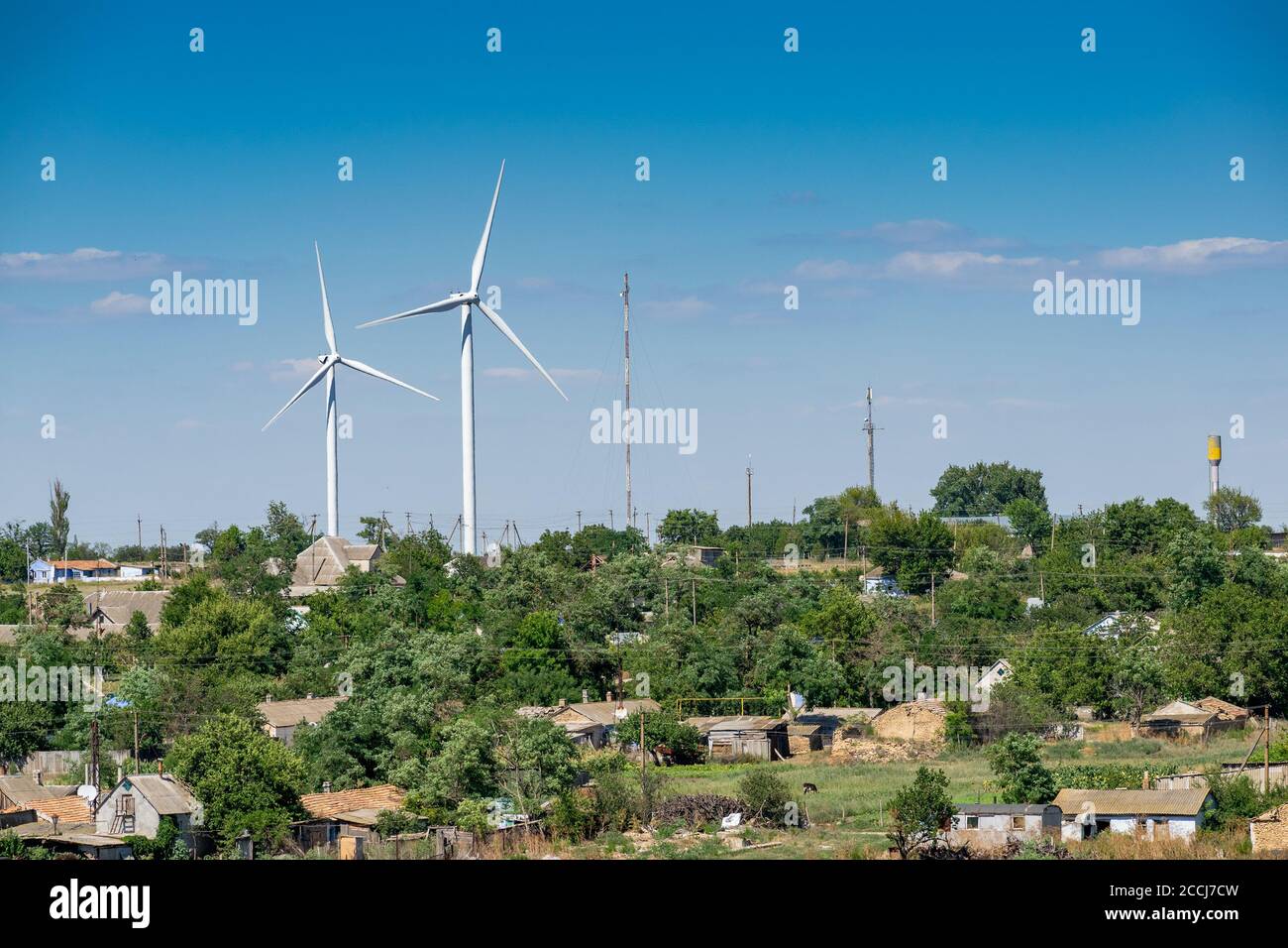 Wind turbines on the hill in the rural area landscape Stock Photo - Alamy