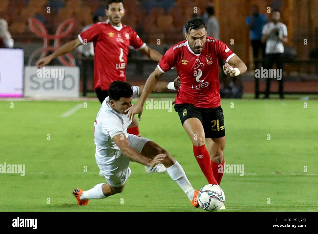 Cairo, Egypt. 22nd Aug, 2020. Ali Maaloul (R) of Al-Ahly competes during an Egyptian Premier League football match between Zamalek and Al-Ahly in Cairo, Egypt, Aug. 22, 2020. Credit: Ahmed Gomaa/Xinhua/Alamy Live News Stock Photo