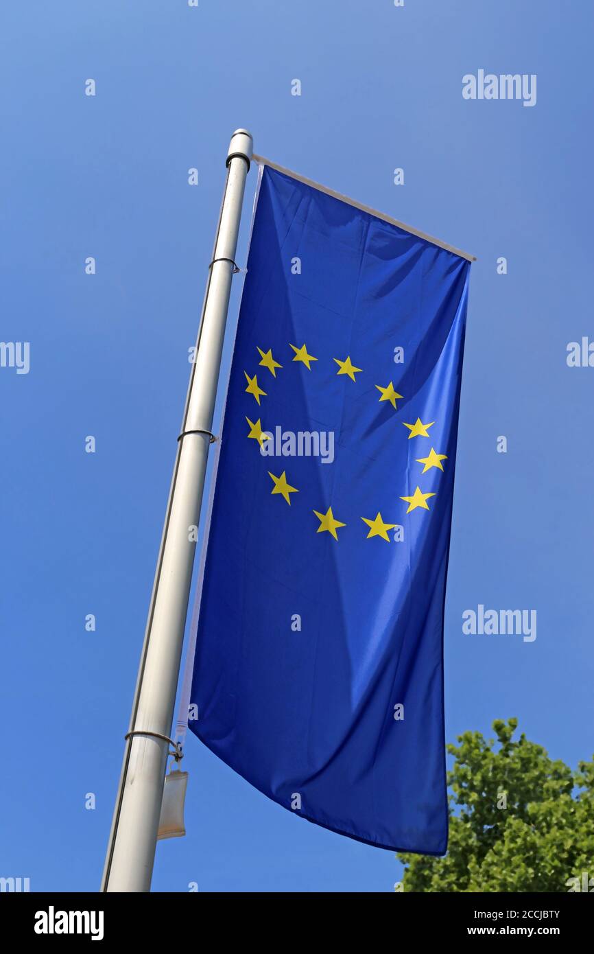 Flag of the European Union in front of a blue blue sky Stock Photo - Alamy
