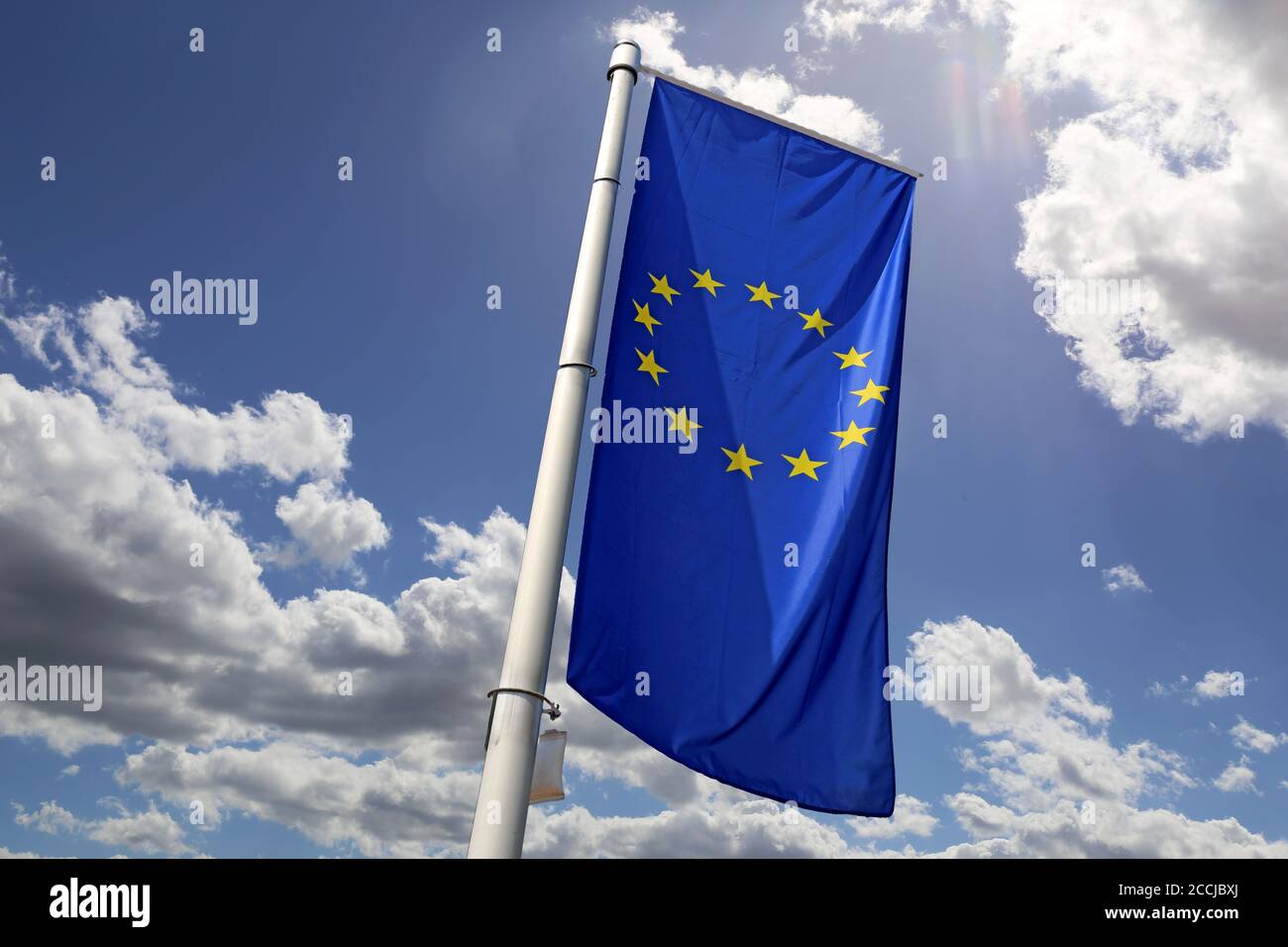 Flag of the European Union in front of a blue blue sky Stock Photo - Alamy