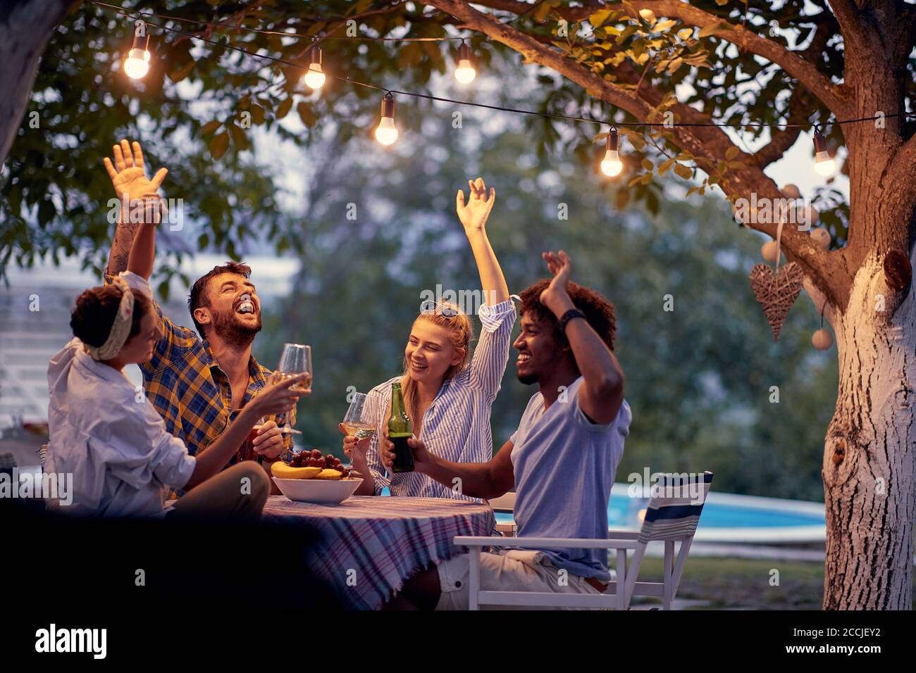 Friends at party.Cheerful  friends having fun together. Stock Photo