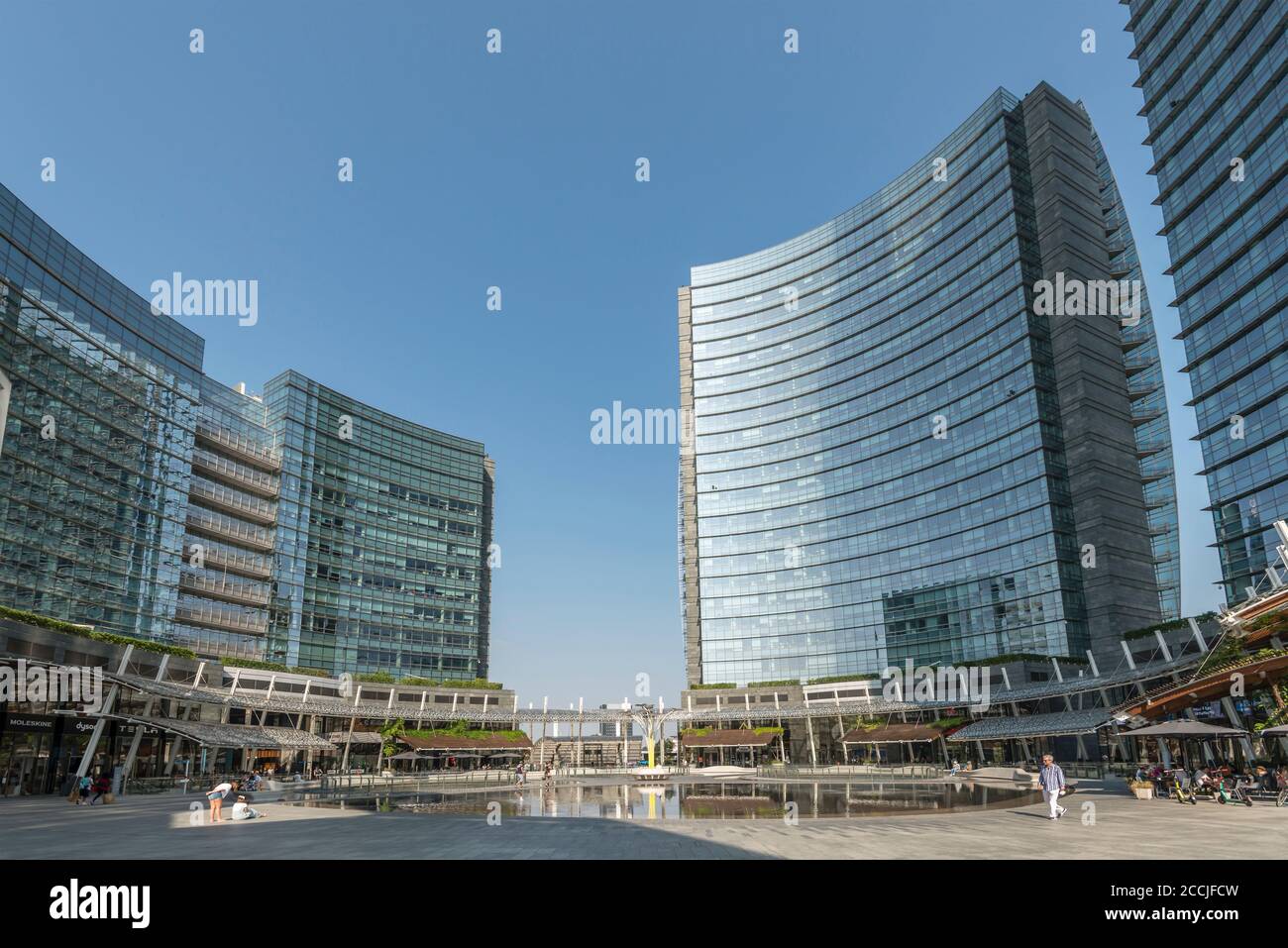 MILAN, ITALY - August 20 2020: cityscape with almost no people around main pond at business hub urban renewal development, shot on august 20 2020 at M Stock Photo