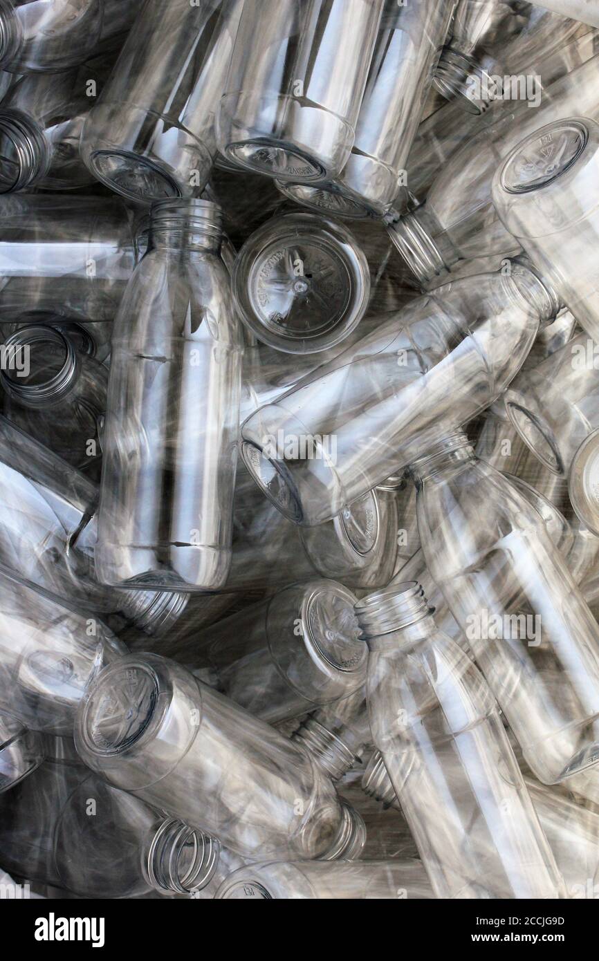 Clean plastic bottles stacked in a factory Stock Photo Alamy