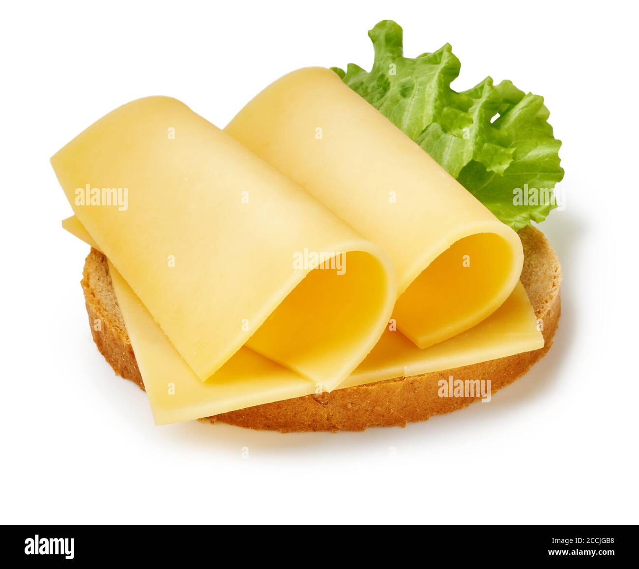 Cheese slices with salad leaf on piece of bread. Sandwich isolated on white background. Stock Photo