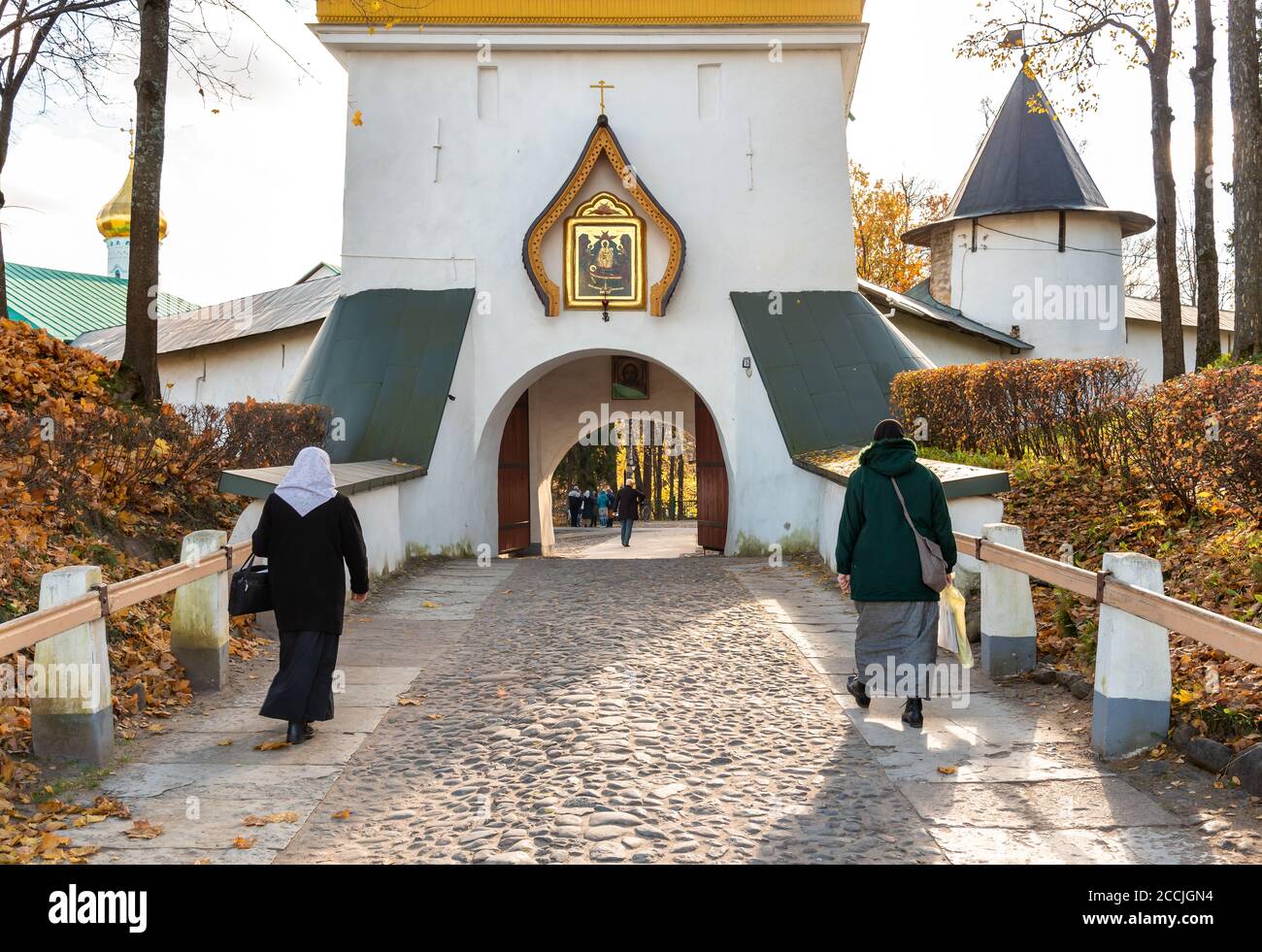 Pechory, Russian Federation - October 21, 2018: People visiting the Pskovo-Pechersky Dormition Monastery Stock Photo