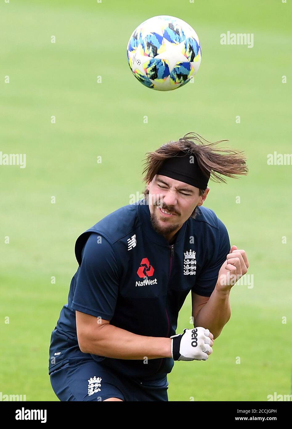 England's Rory Burns controls a football during the warm ip before day three of the Third Test match at the Ageas Bowl, Southampton. Stock Photo