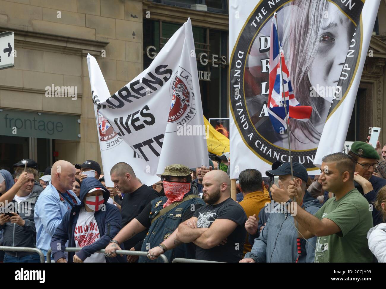 Right wing anti-pedophile protesters with banners, in Nottingham. Stock Photo
