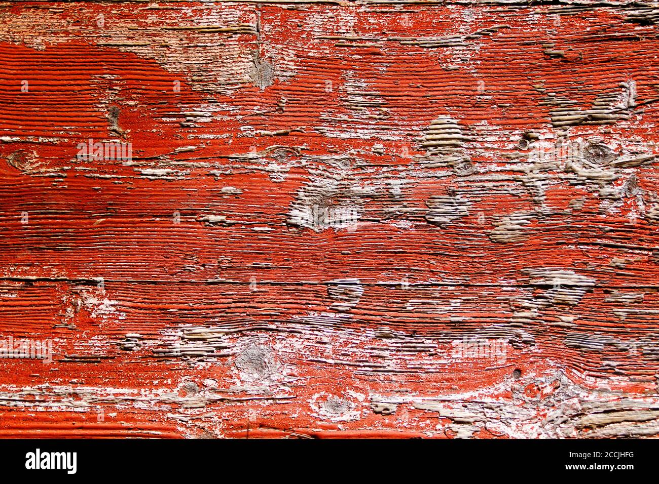 Rustic old weathered red wood plank background Red on a wooden surface, worn, wood texture - Peeling red paint on a wooden - fo Stock Photo - Alamy