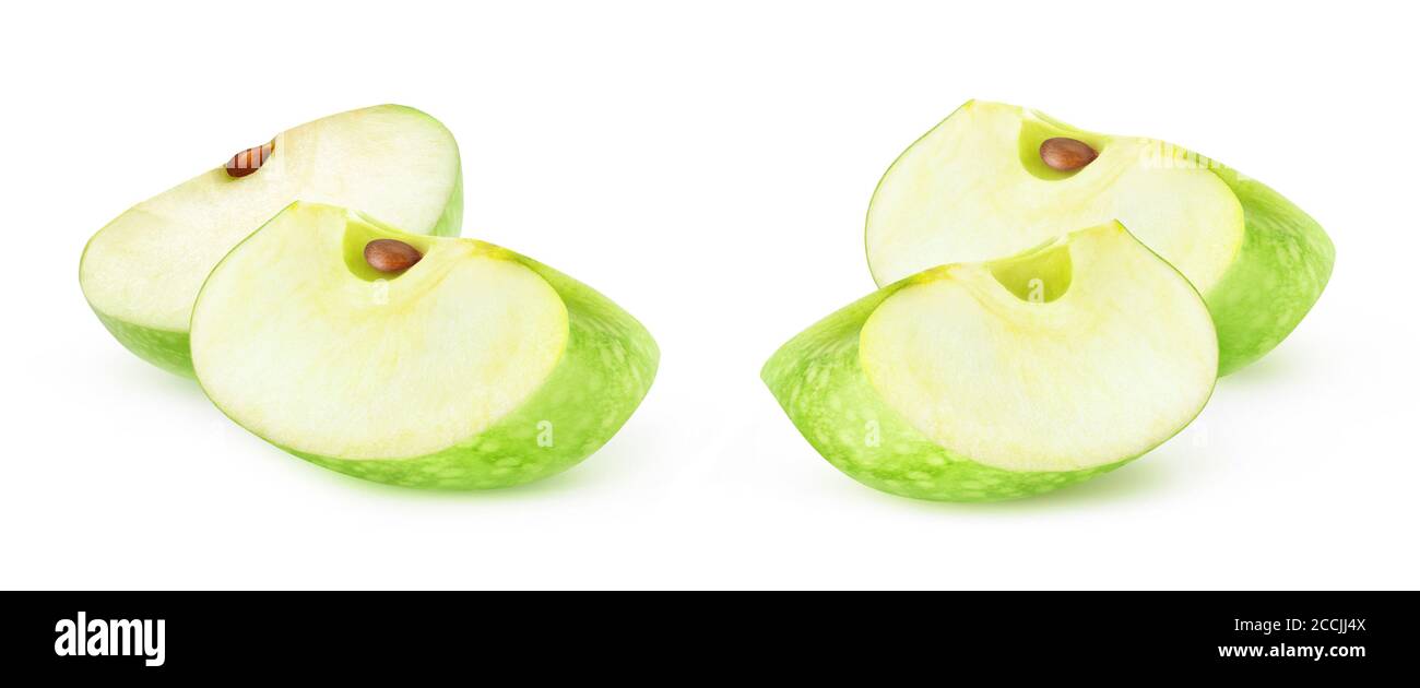 Isolated apple slices. Two pieces of green apple fruit isolated on white background Stock Photo
