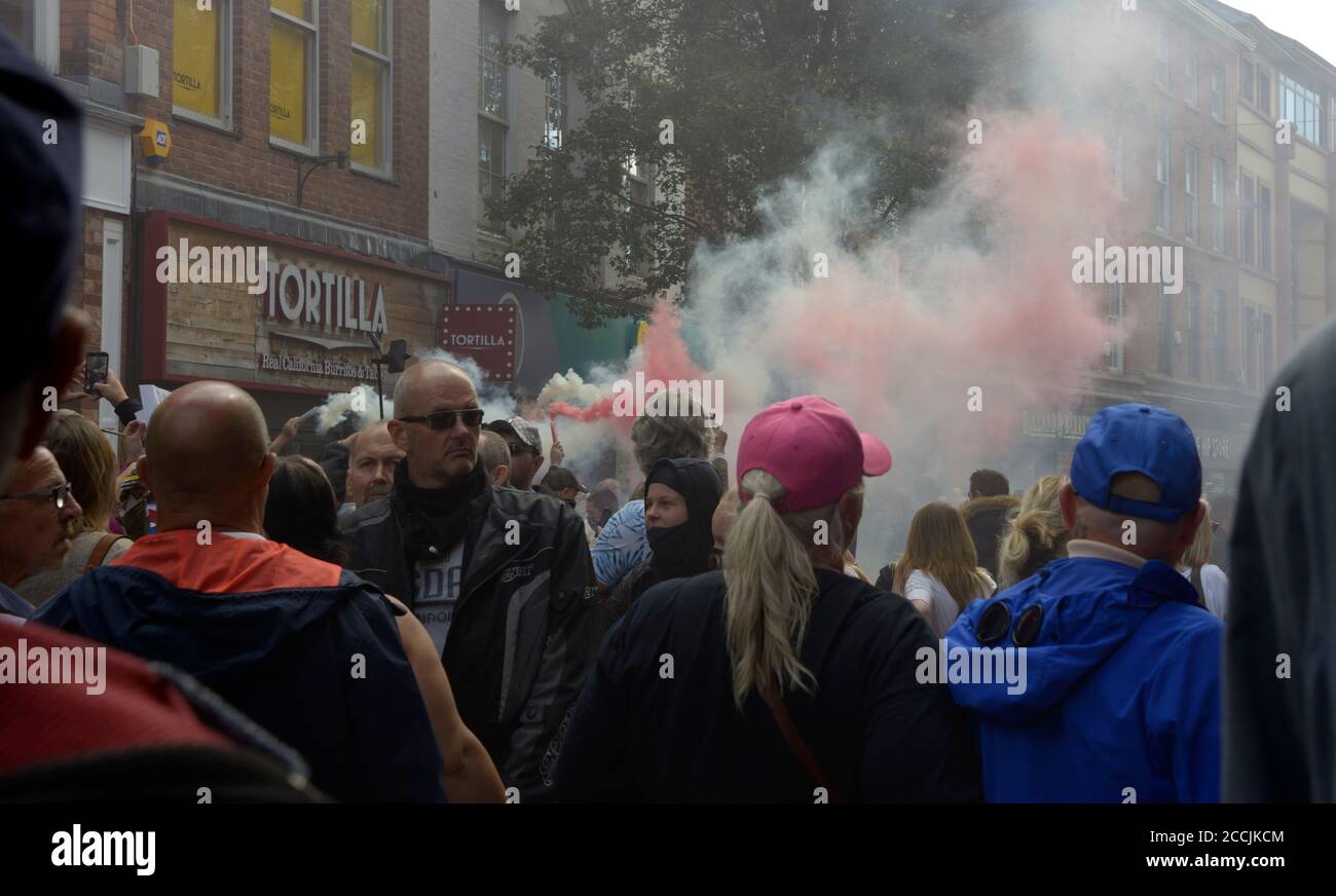 Right wing protest, with smoke flares, in Nottingham Stock Photo