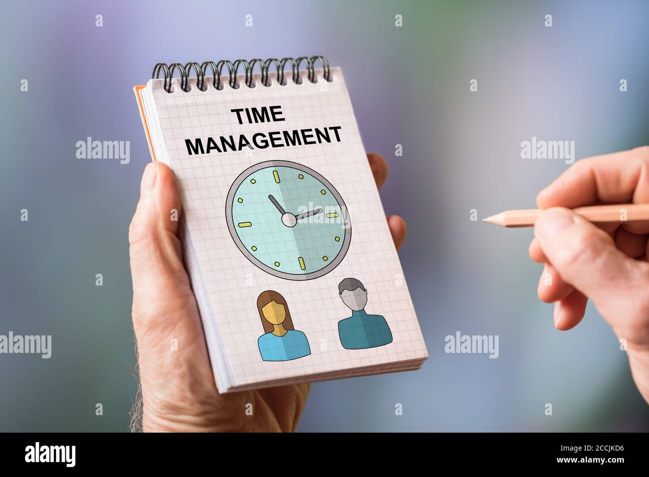 Hand drawing time management concept on a notepad Stock Photo - Alamy