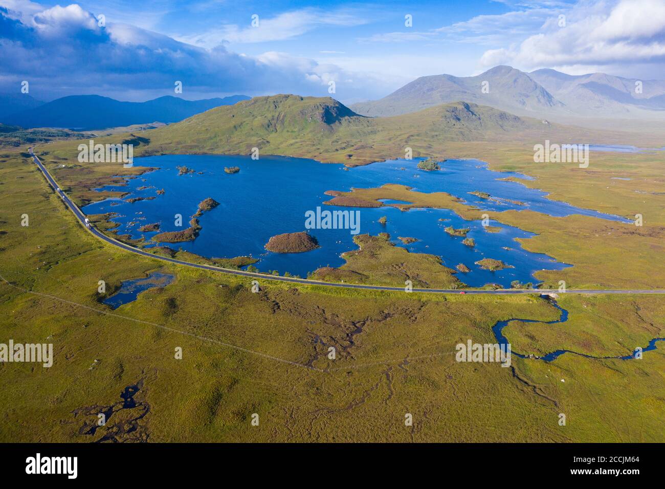 Aerial view of Lochan na h-Achlaise and A82 road crossing Rannoch Moor in summer, Scotland, UK Stock Photo